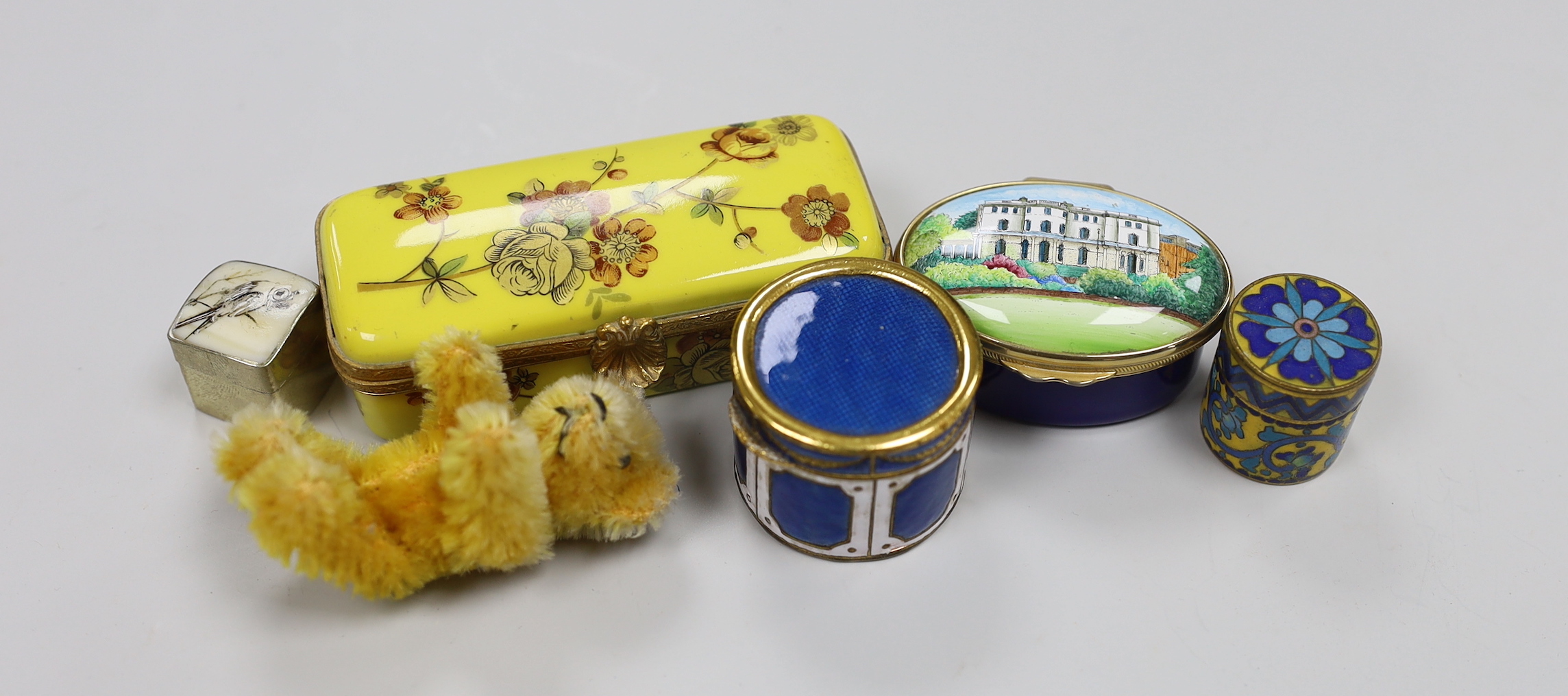 A Schuco miniature bear and various enamel or porcelain trinket boxes